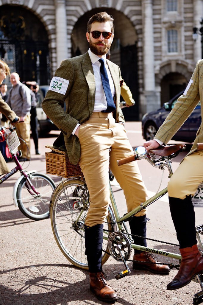 Guy posing on tandem bike for Tweed Run London 2015