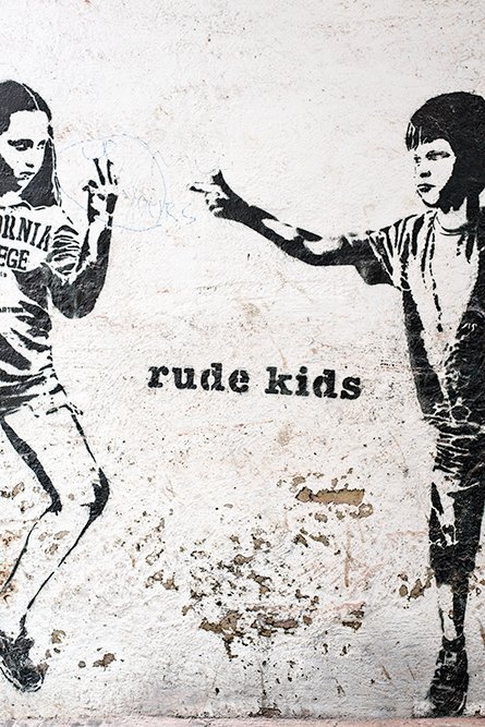 Exploring London villages: Bermondsey Street near London Bridge. Rude Kids street art.