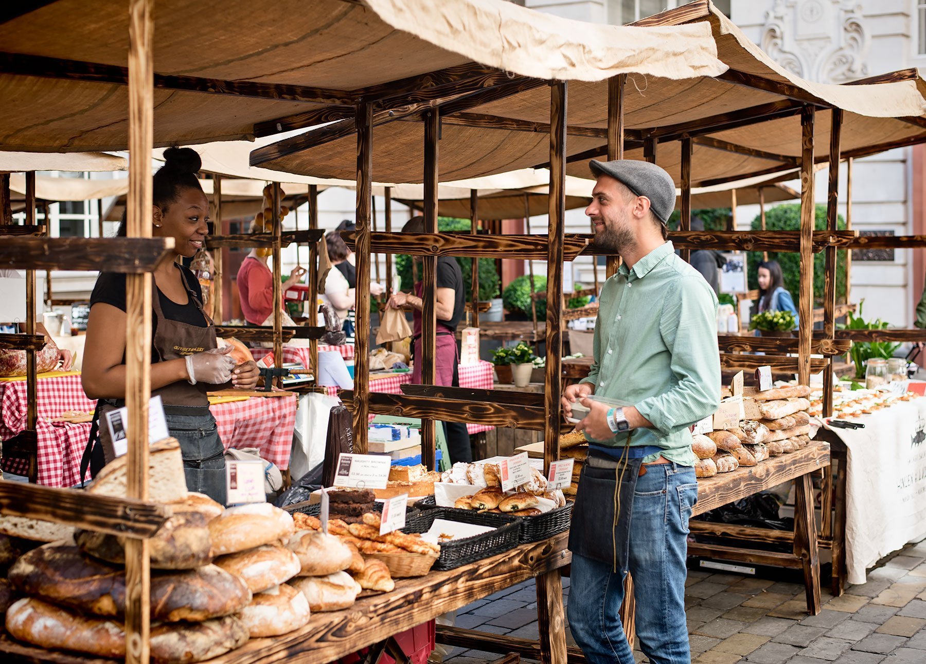 The Slow Food & Living Market in the inner courtyard of the Rosewood London hotel in Holborn. Selling bread from Olivier's Bakery.