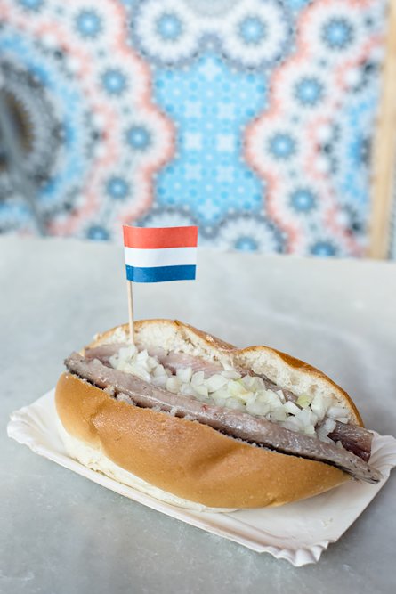 Things to do and see in the Netherlands: Markthal, a food market in Rotterdam. Broodje Haring.