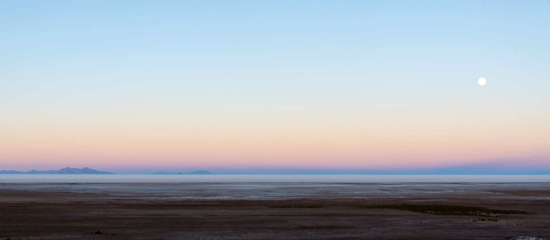 Sunrise on the salt flats from salt hotel Luna Salada - Salar de Uyuni: 5 Unforgettable Experiences on Bolivia's Salt Flats and Colored Lagoons