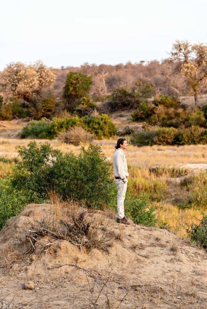 Game drive guide looking for animals in South Africa - - Check out my review of staying at Klaserie Sands River Camp, a beautiful boutique (4 suites), luxury safari lodge in Greater Kruger (Big 5), South Africa