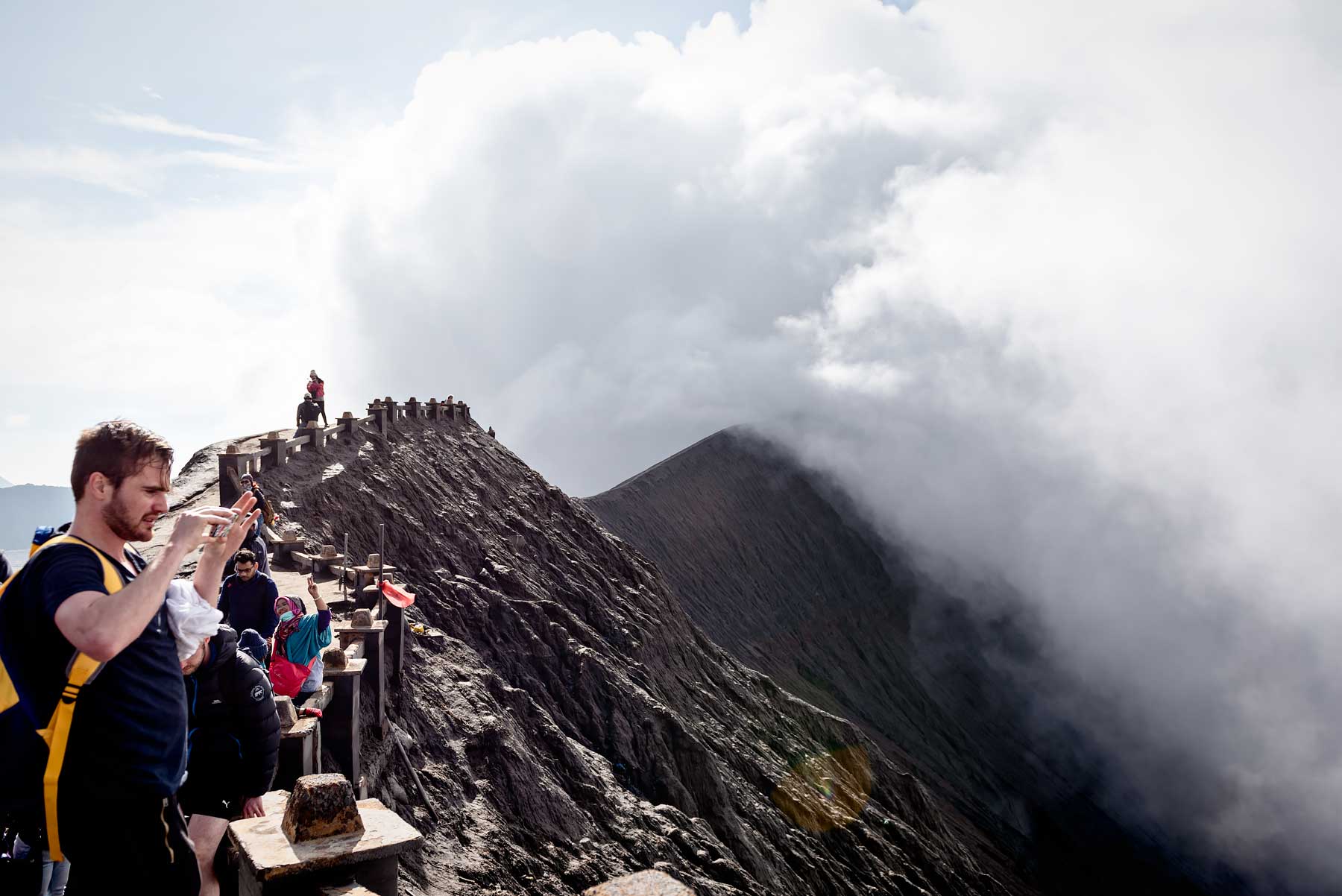 Standing at the edge of the crater at Mount Bromo. Read the review of my Mount Bromo Tour: Climbing an active volcano in East Java, Indonesia on Urban Pixxels.