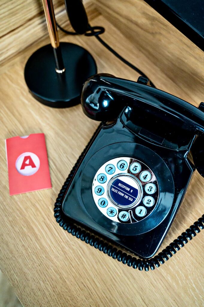 Old telephone in the hotel room of Amerikalinjen in Oslo, Norway
