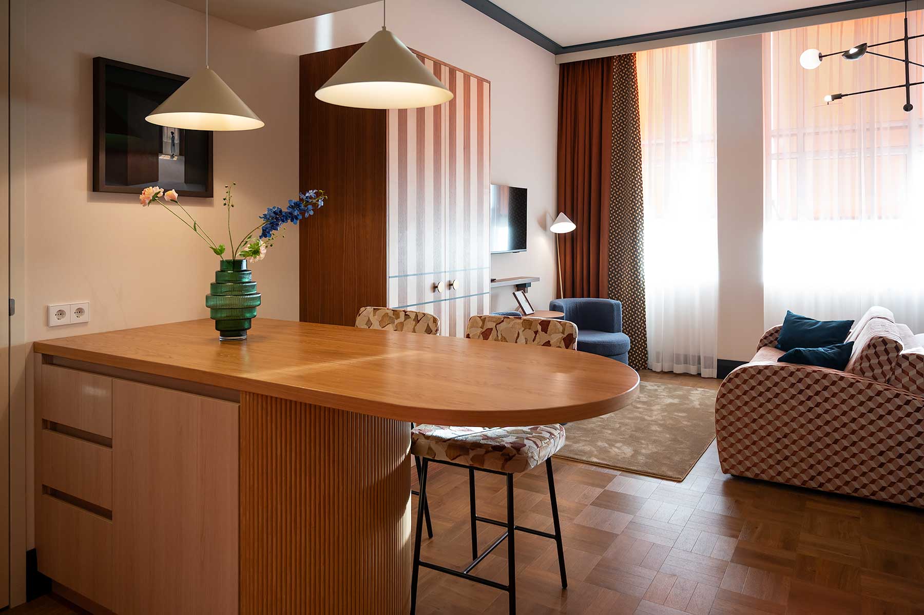 Kitchenette and sitting area of the DeLuxe Suite at De Plesman hotel in The Hague
