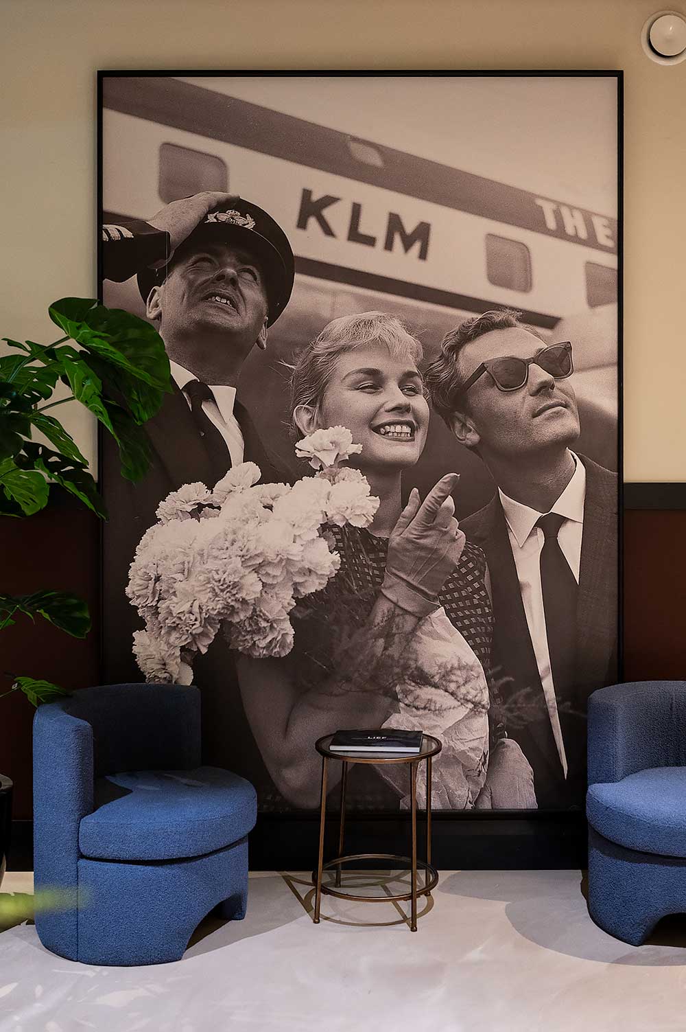 Old photo of people in front of KLM airplane at hotel De Plesman in The Hague