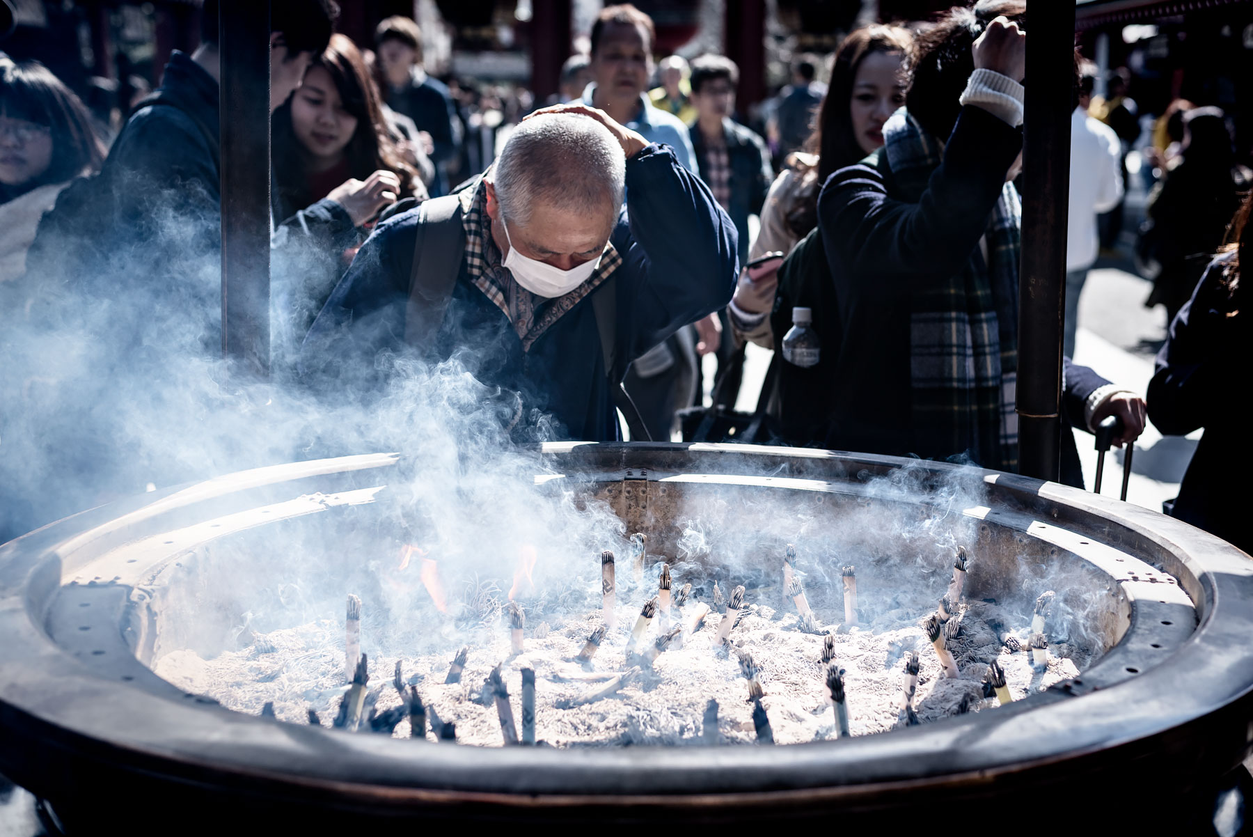 Favorite Things to Do & Places to Eat in Tokyo - Video & Photos on Urban Pixxels (urbanpixxels.com) | Incense rubbing at the Senso-ji temple for good health