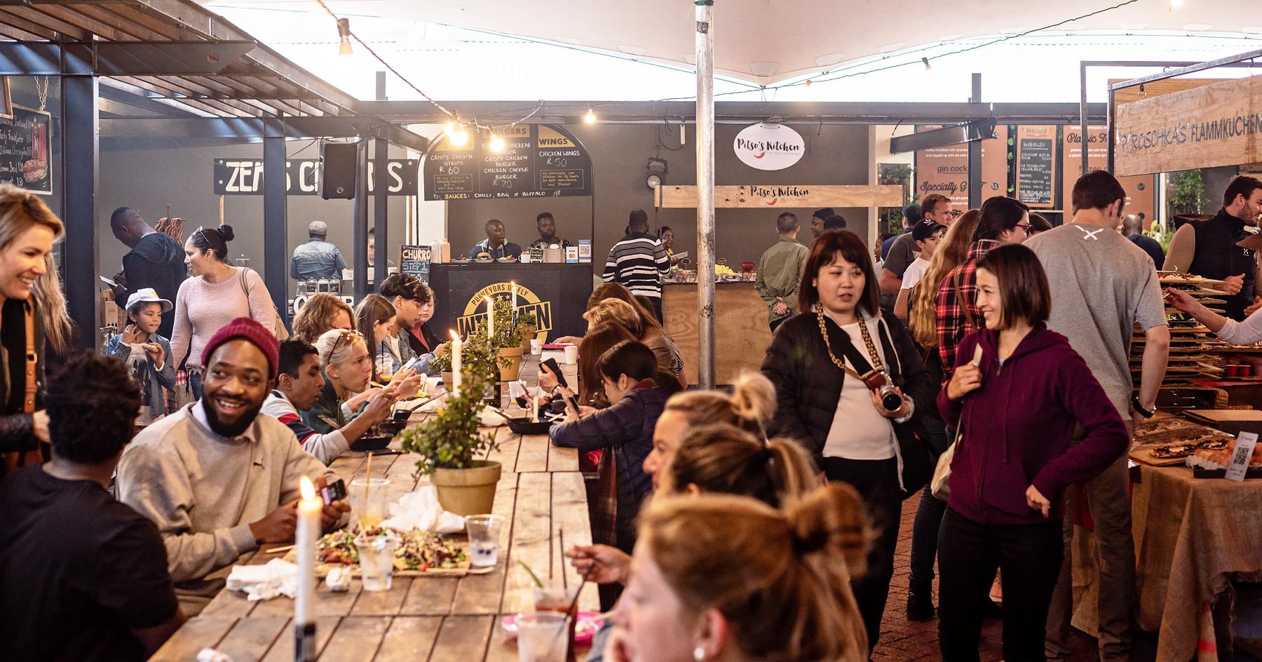 The vibrant Neighbourgoods Market, located at the Old Biscuit Mill (warehouse) in Woodstock, Cape Town.