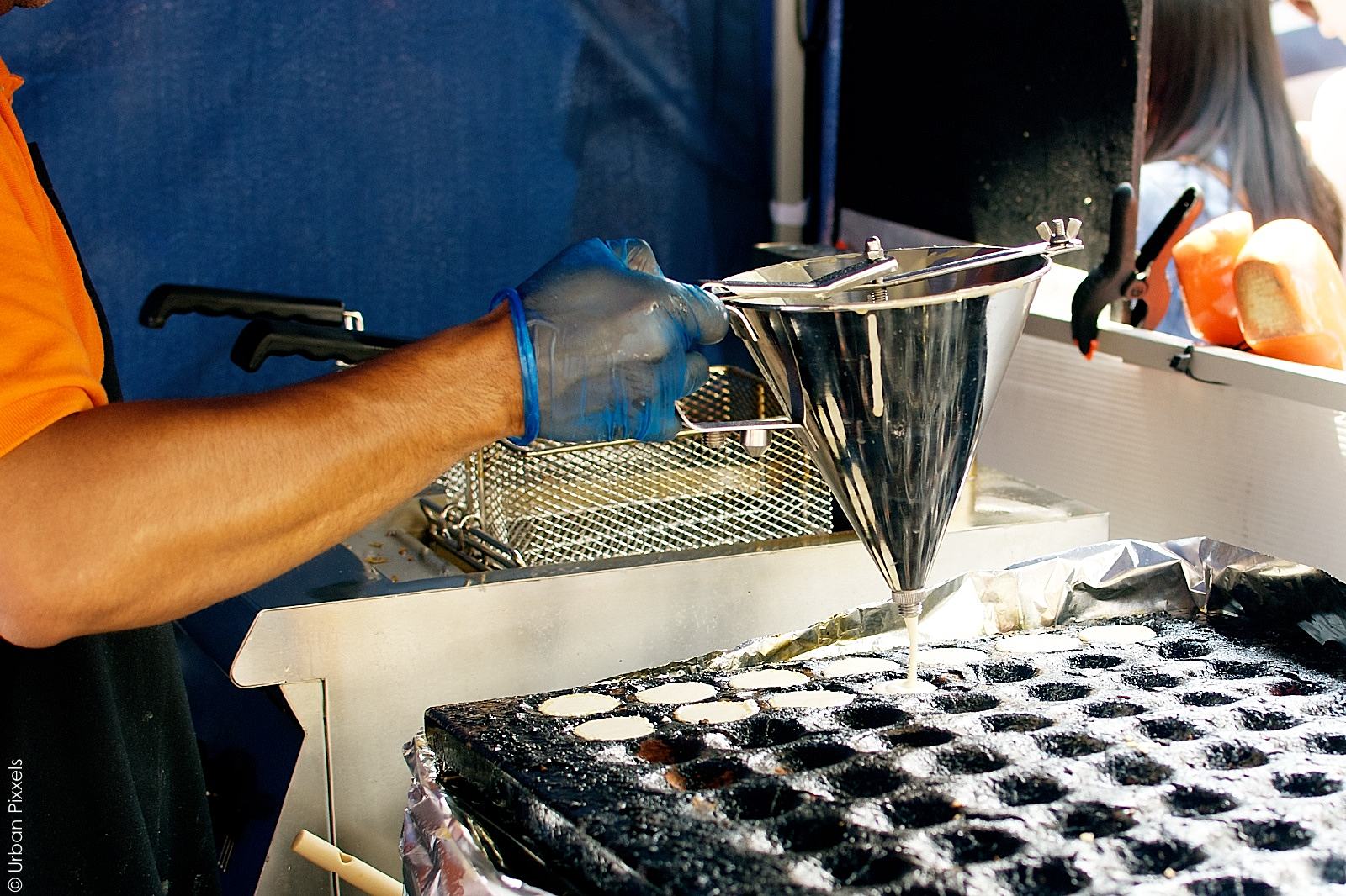The Frying Dutchmen baking poffertjes in Brick Lane