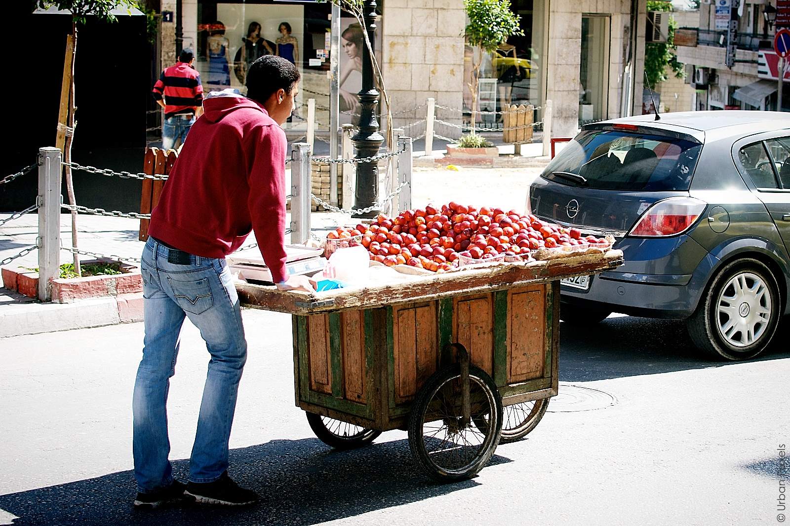 Palestinian boy selling fruit in Ramallah | Urban Pixxels