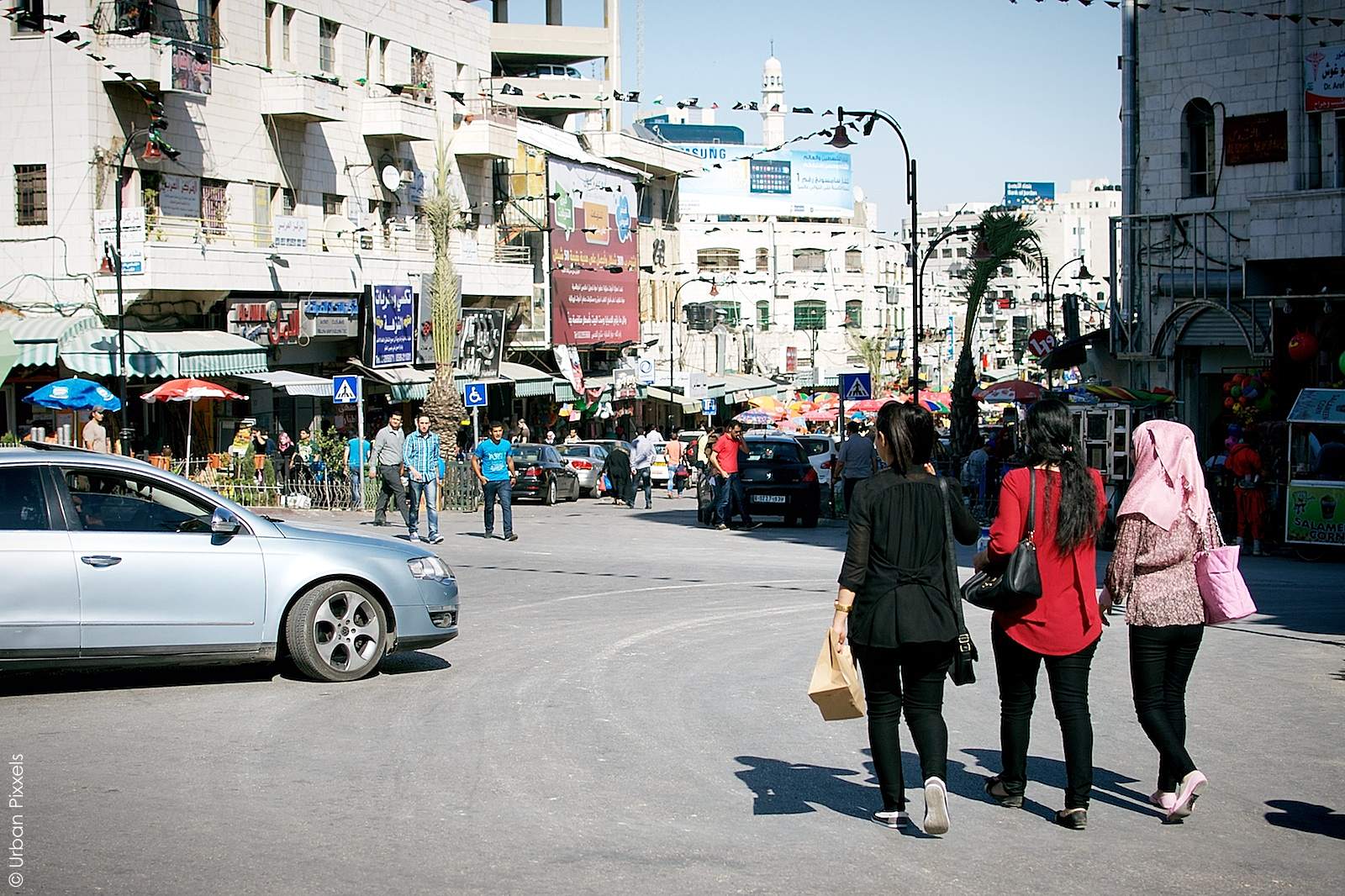 Palestinian girls walking the streets of Ramallah | Urban Pixxels